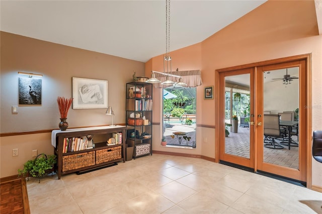 7353 Dogwood Cres, Spring Hill, FL 34607 - doorway featuring french doors, vaulted ceiling, baseboards, and tile patterned floors