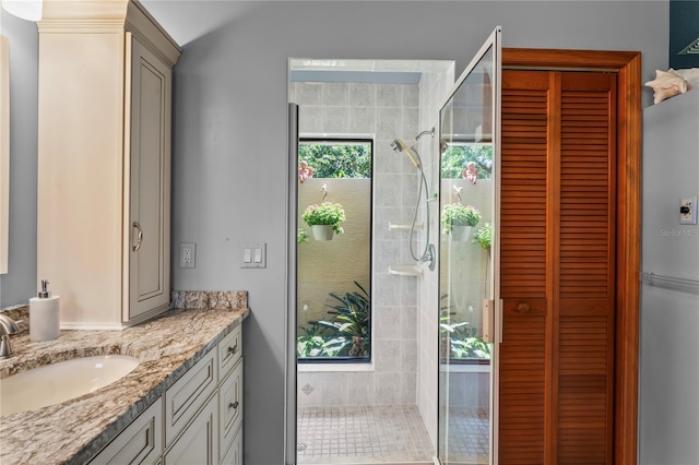 7353 Dogwood Cres, Spring Hill, FL 34607 - bathroom with a stall shower, vanity, and a closet