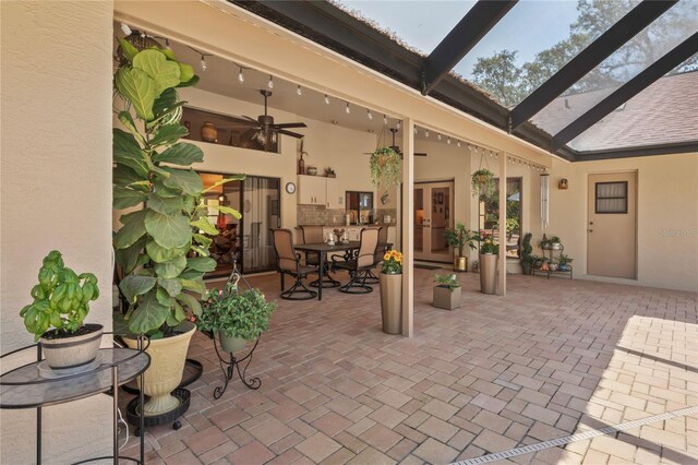 7353 Dogwood Cres, Spring Hill, FL 34607 - view of patio / terrace with a ceiling fan and glass enclosure