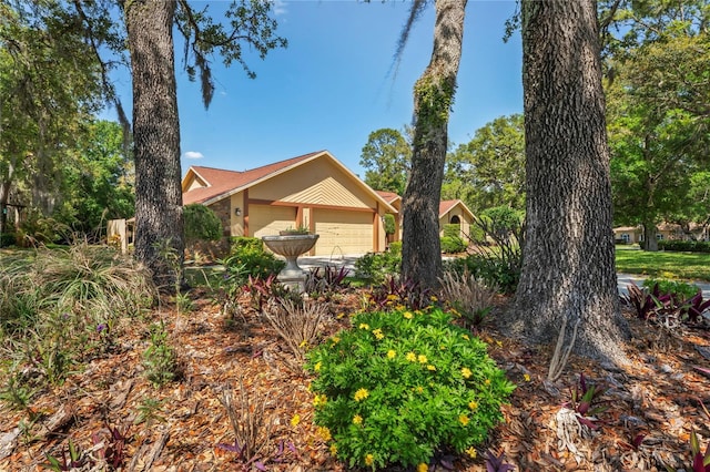 7353 Dogwood Cres, Spring Hill, FL 34607 - view of home's exterior featuring a garage
