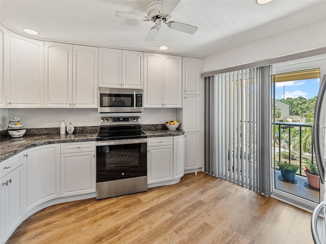 kitchen featuring a ceiling fan, appliances with stainless steel finishes, light wood-type flooring, recessed lighting, and white cabinetry