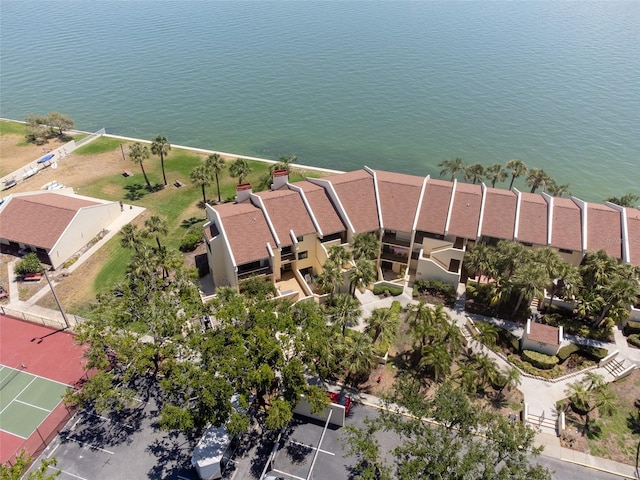 birds eye view of property with a water view and a residential view