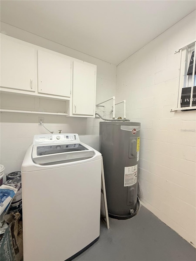 635 Mccormick St, Daytona Beach, FL 32114 - laundry room with water heater, concrete block wall, cabinet space, and washer and clothes dryer