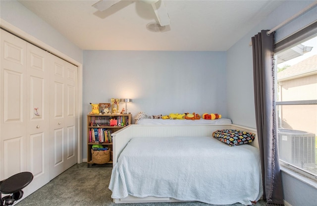 bedroom featuring a closet, carpet flooring, and ceiling fan