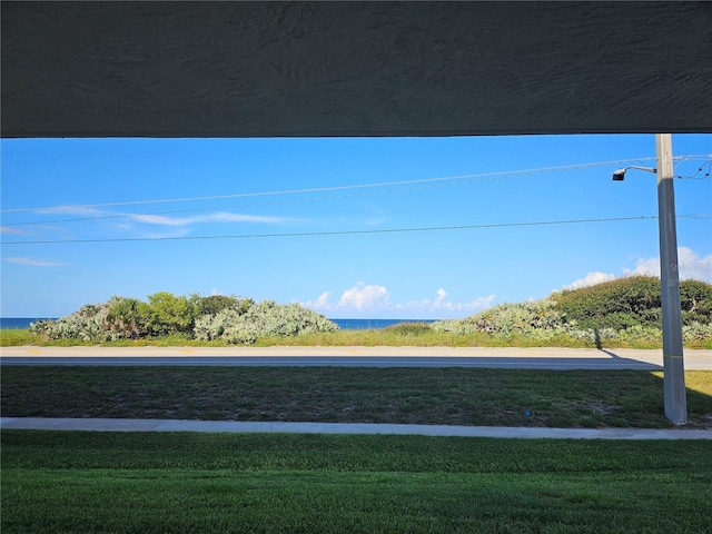 3100 Ocean Shore Blvd Unit 101, Ormond Beach, FL 32176 - view of yard featuring a water view