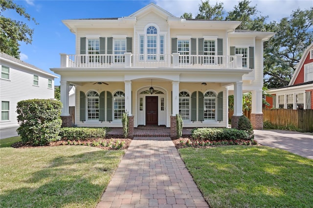 view of front of home with a balcony and a porch