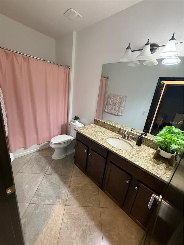 full bathroom with vanity, toilet, tile patterned floors, shower / bath combination with curtain, and visible vents