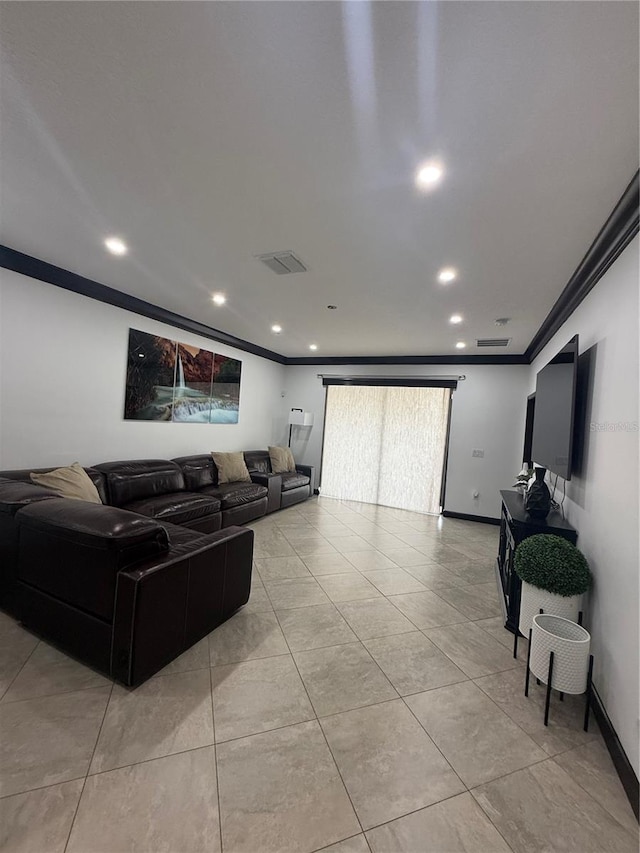 living area with ornamental molding, recessed lighting, and visible vents