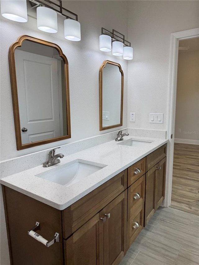 bathroom with double vanity and a sink