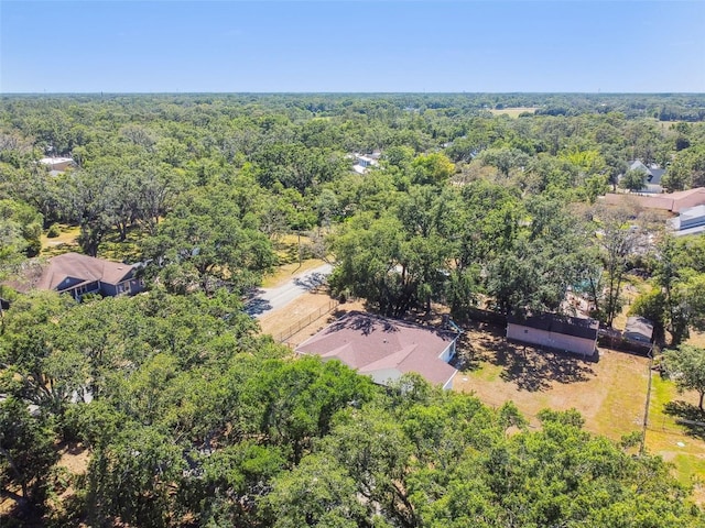 aerial view featuring a view of trees