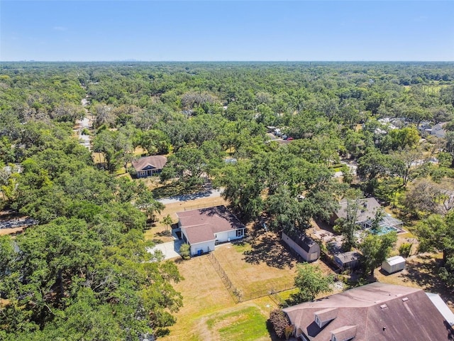 bird's eye view featuring a forest view