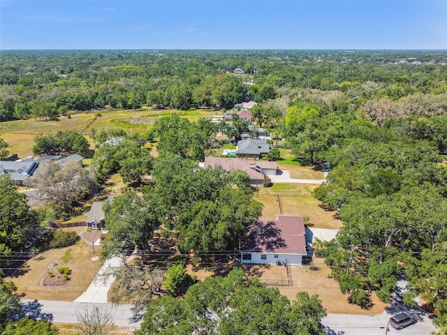 bird's eye view featuring a view of trees