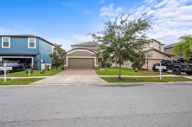 11871 Crestridge Loop, Trinity, FL 34655 - view of front facade with stucco siding, an attached garage, driveway, and a front lawn