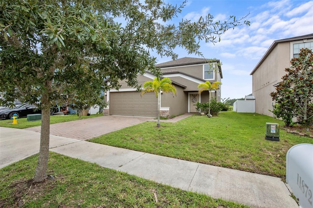 11871 Crestridge Loop, Trinity, FL 34655 - traditional-style home with decorative driveway, an attached garage, a front yard, and stucco siding