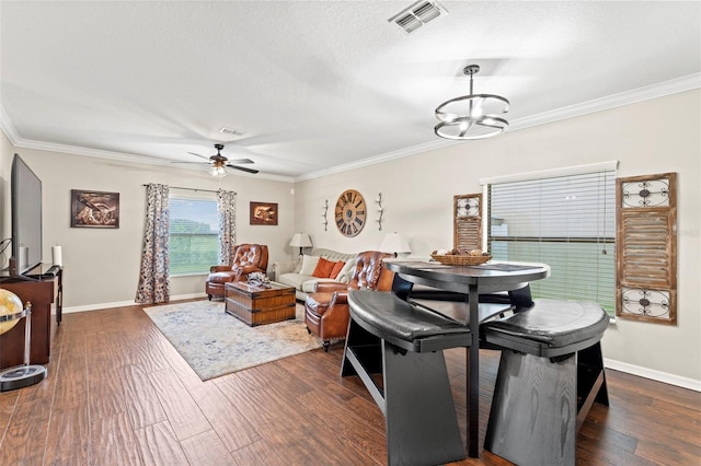 11871 Crestridge Loop, Trinity, FL 34655 - dining room with dark wood-style flooring, baseboards, visible vents, and ornamental molding