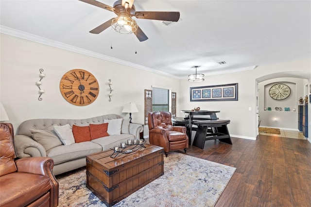 11871 Crestridge Loop, Trinity, FL 34655 - living area featuring ornamental molding, baseboards, hardwood / wood-style flooring, arched walkways, and ceiling fan with notable chandelier