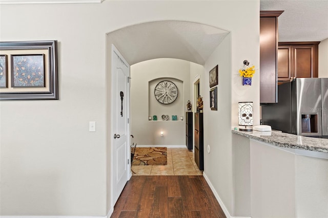 11871 Crestridge Loop, Trinity, FL 34655 - hallway with baseboards and dark wood finished floors