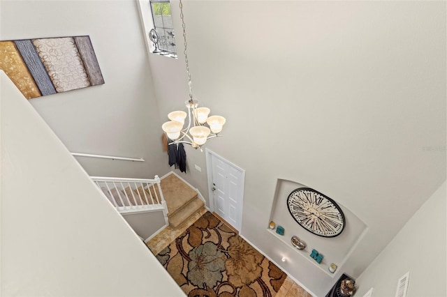 11871 Crestridge Loop, Trinity, FL 34655 - staircase with baseboards and a notable chandelier
