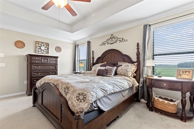 11871 Crestridge Loop, Trinity, FL 34655 - bedroom featuring crown molding, light carpet, a raised ceiling, a ceiling fan, and baseboards