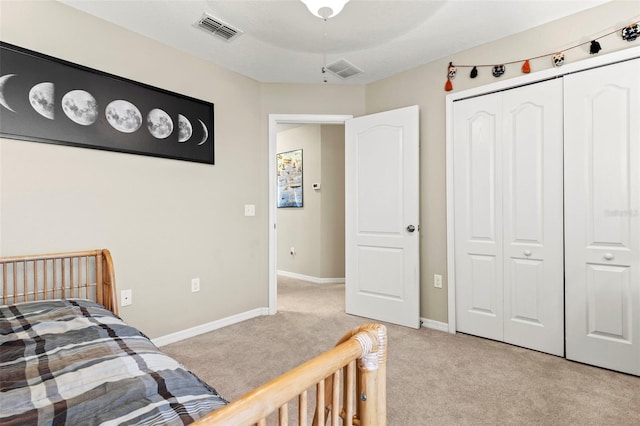11871 Crestridge Loop, Trinity, FL 34655 - bedroom with baseboards, light carpet, a closet, and visible vents