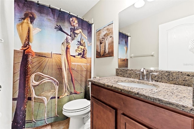 11871 Crestridge Loop, Trinity, FL 34655 - bathroom with vanity, tile patterned flooring, and toilet