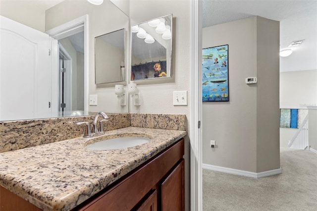 11871 Crestridge Loop, Trinity, FL 34655 - bathroom with baseboards, visible vents, and vanity