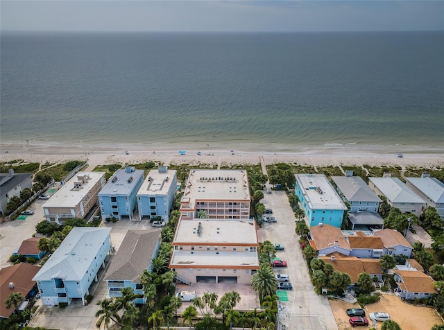 aerial view with a view of the beach and a water view