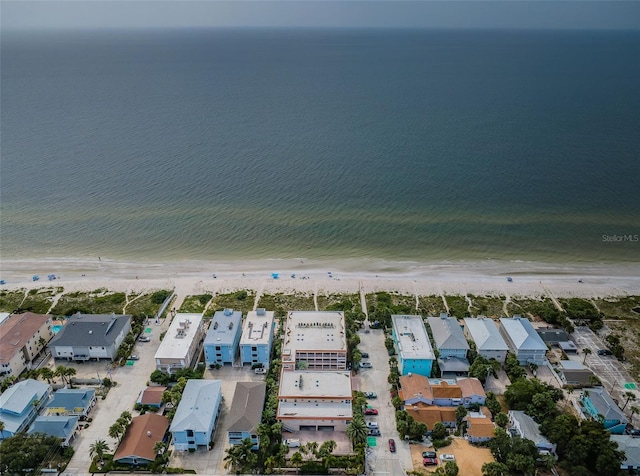 aerial view with a view of the beach and a water view