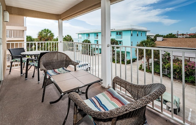 balcony featuring outdoor dining space