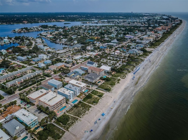 bird's eye view with a view of the beach and a water view
