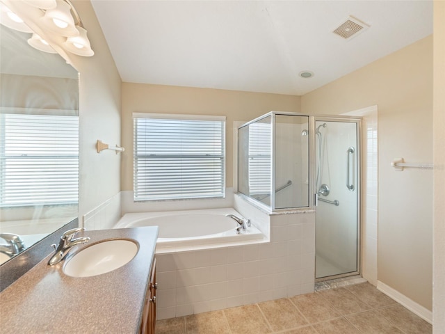 bathroom with vanity, tile patterned floors, a shower stall, visible vents, and a garden tub