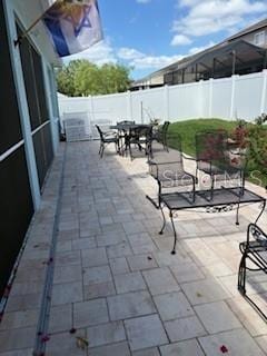 view of patio / terrace with a fenced backyard and outdoor dining space