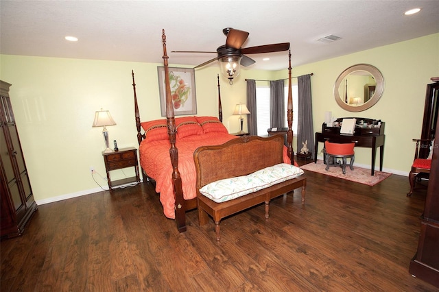 bedroom with baseboards, recessed lighting, and wood finished floors