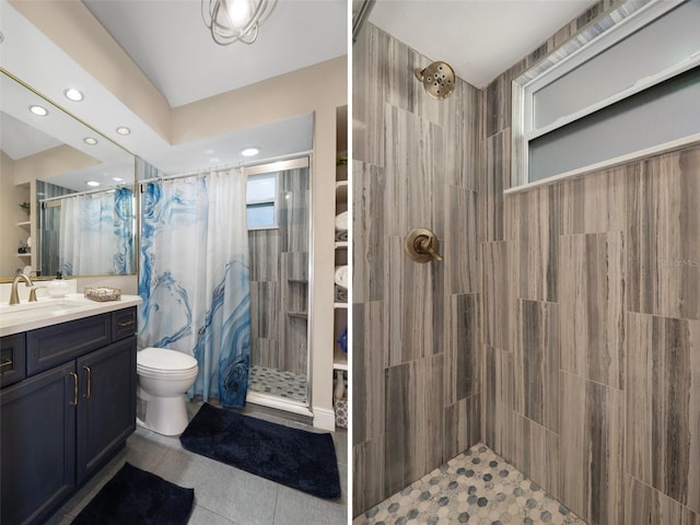 bathroom featuring recessed lighting, tiled shower, toilet, vanity, and tile patterned floors