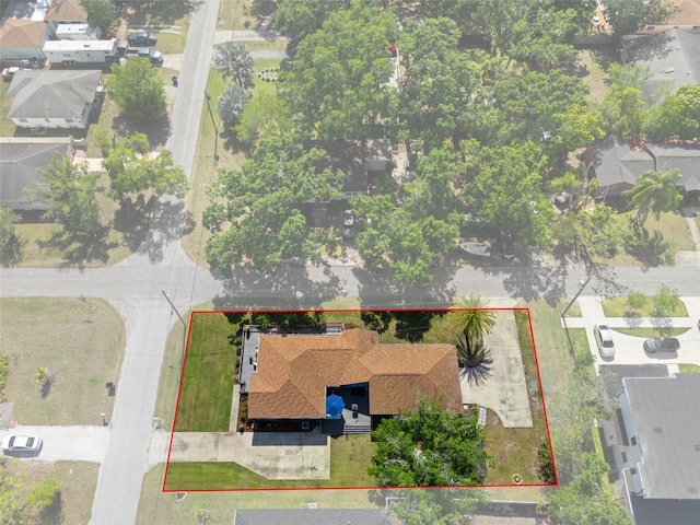aerial view of residential area with property boundaries highlighted