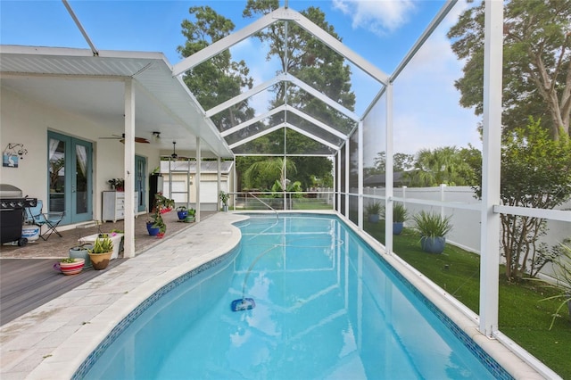 4101 Brooke Dr, Valrico, FL 33594 - view of swimming pool with french doors, a ceiling fan, a patio, area for grilling, and glass enclosure