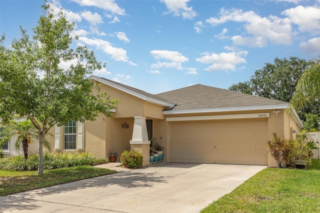 ranch-style house with stucco siding, driveway, and a garage