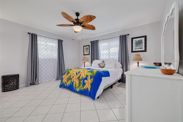 bedroom featuring light tile patterned floors and a ceiling fan