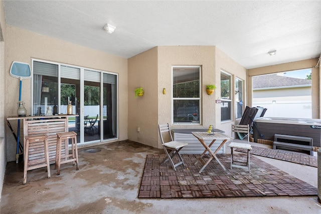 11845 Newberry Grove Loop, Riverview, FL 33579 - view of patio featuring a hot tub