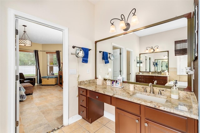 11845 Newberry Grove Loop, Riverview, FL 33579 - ensuite bathroom with vanity and tile patterned flooring