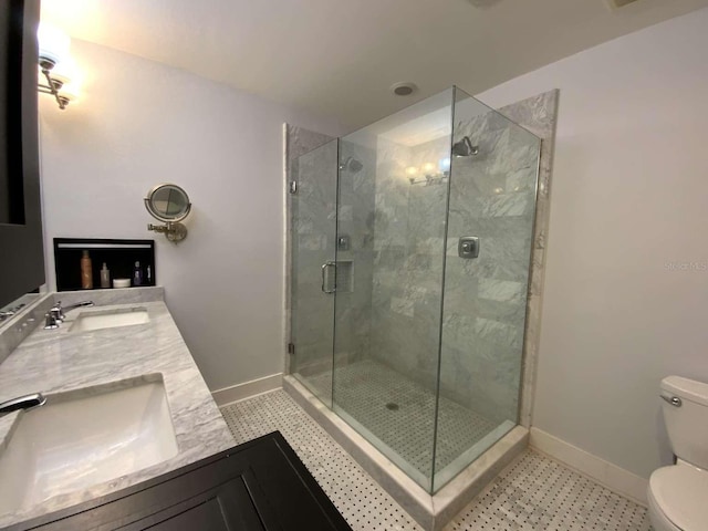 209 Rosery Rd, Belleair, FL 33756 - full bath with baseboards, toilet, a shower stall, and double vanity