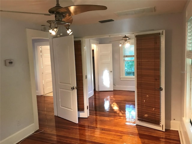 122 19th Ave N, Saint Petersburg, FL 33704 - unfurnished dining area with baseboards, ceiling fan, and wood finished floors