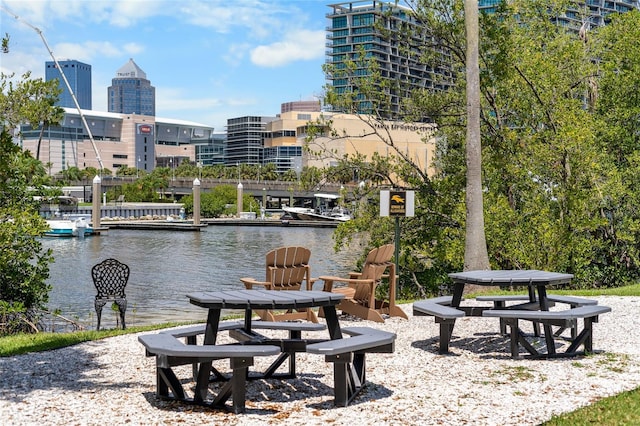 view of community with a view of city and a water view