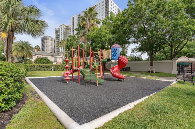 community playground featuring a yard