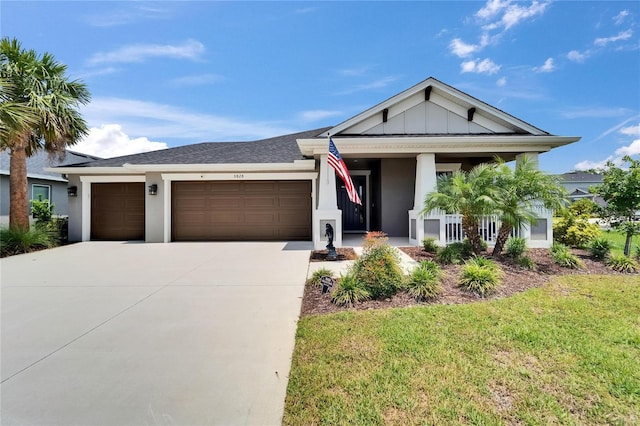 5828 Clairwood Ct, Palmetto, FL 34221 - ranch-style home with an attached garage, concrete driveway, stucco siding, and a front lawn