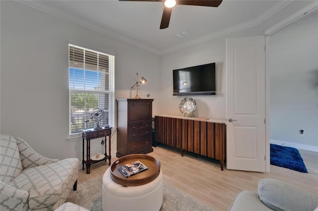 5828 Clairwood Ct, Palmetto, FL 34221 - living area featuring a ceiling fan, ornamental molding, light wood-style flooring, and baseboards