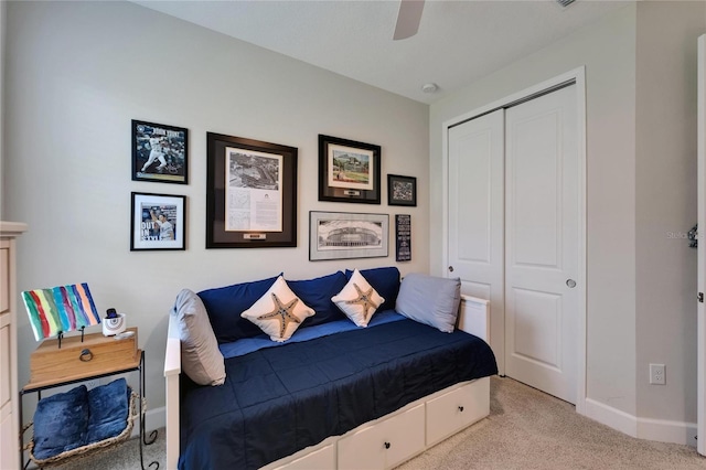 5828 Clairwood Ct, Palmetto, FL 34221 - bedroom with carpet flooring, a closet, baseboards, and a ceiling fan