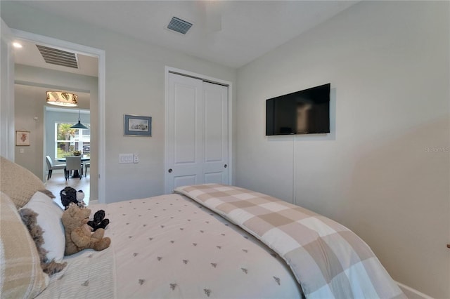 5828 Clairwood Ct, Palmetto, FL 34221 - bedroom featuring a closet and a ceiling fan