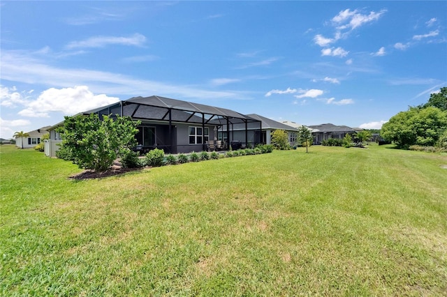 5828 Clairwood Ct, Palmetto, FL 34221 - view of grassy yard with glass enclosure