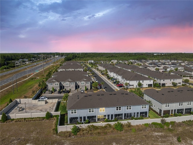 aerial view at dusk with a residential view